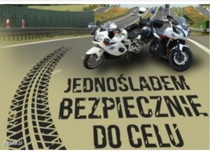 plakat Jednośladem bezpiecznie do celu przedstawia drogę oraz motocykl