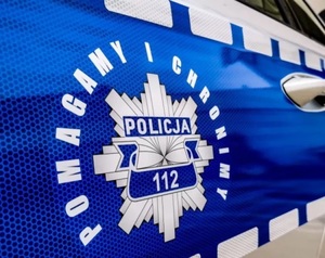 pomagamy i chronimy, napis oraz policyjna gwiazda